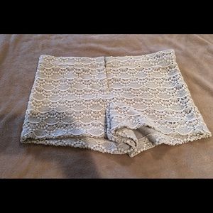 Express brand new with tags lace shorts. Size 10.